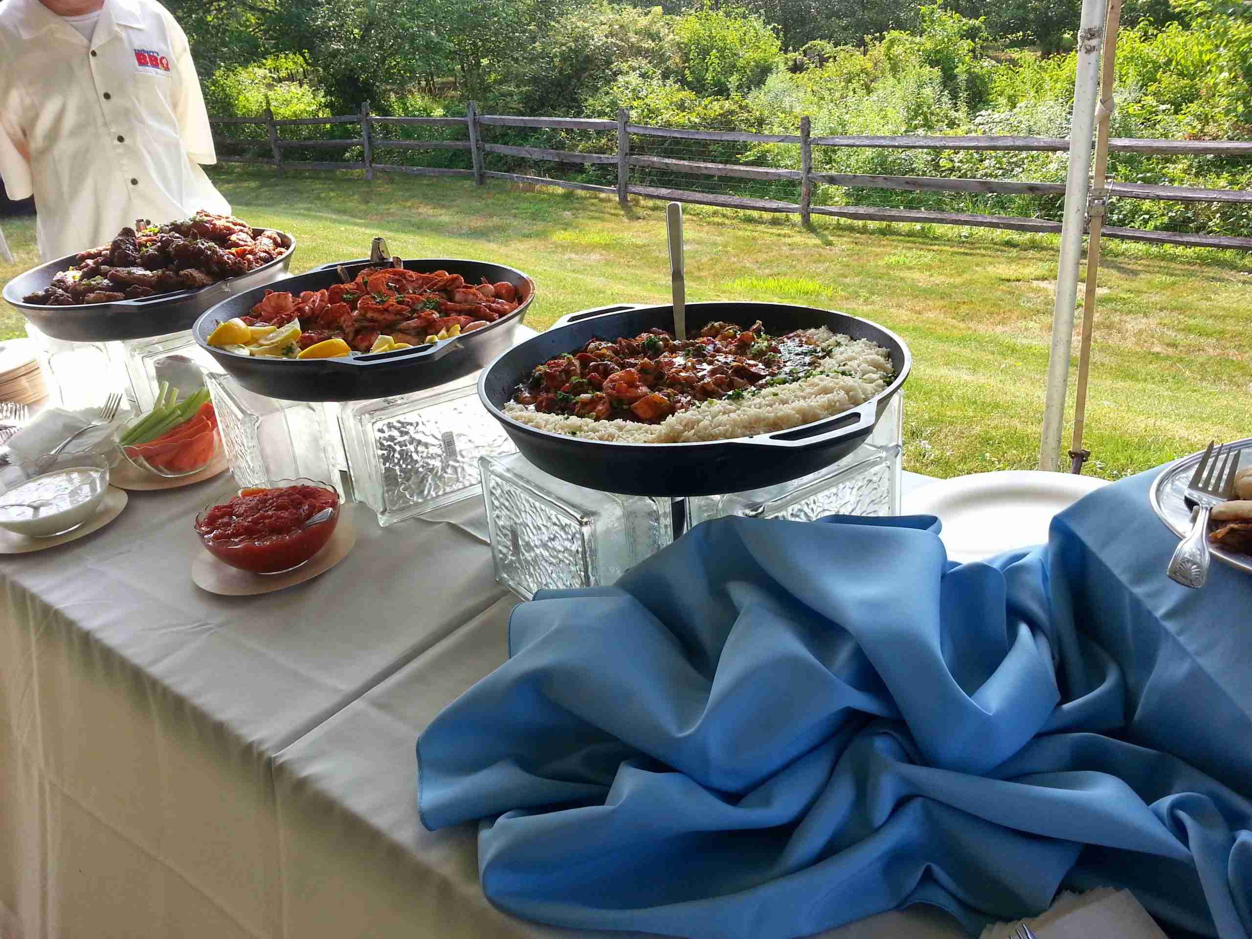 Birthday Zachary's BBQ outdoor birthday catering buffet with cast iron skillets and sides