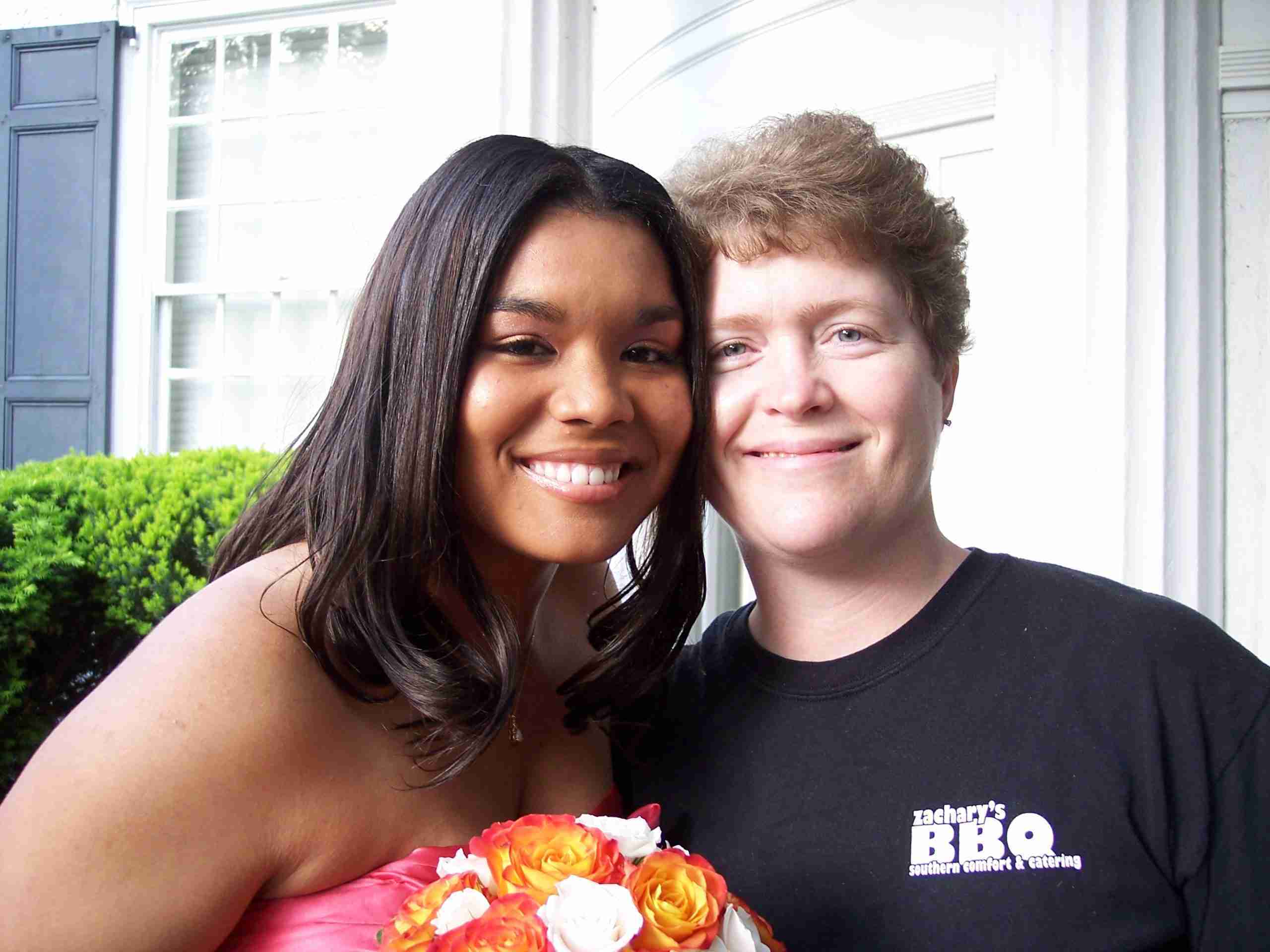 Sami and me Graduation Zachary's BBQ team member with family at a graduation catering event